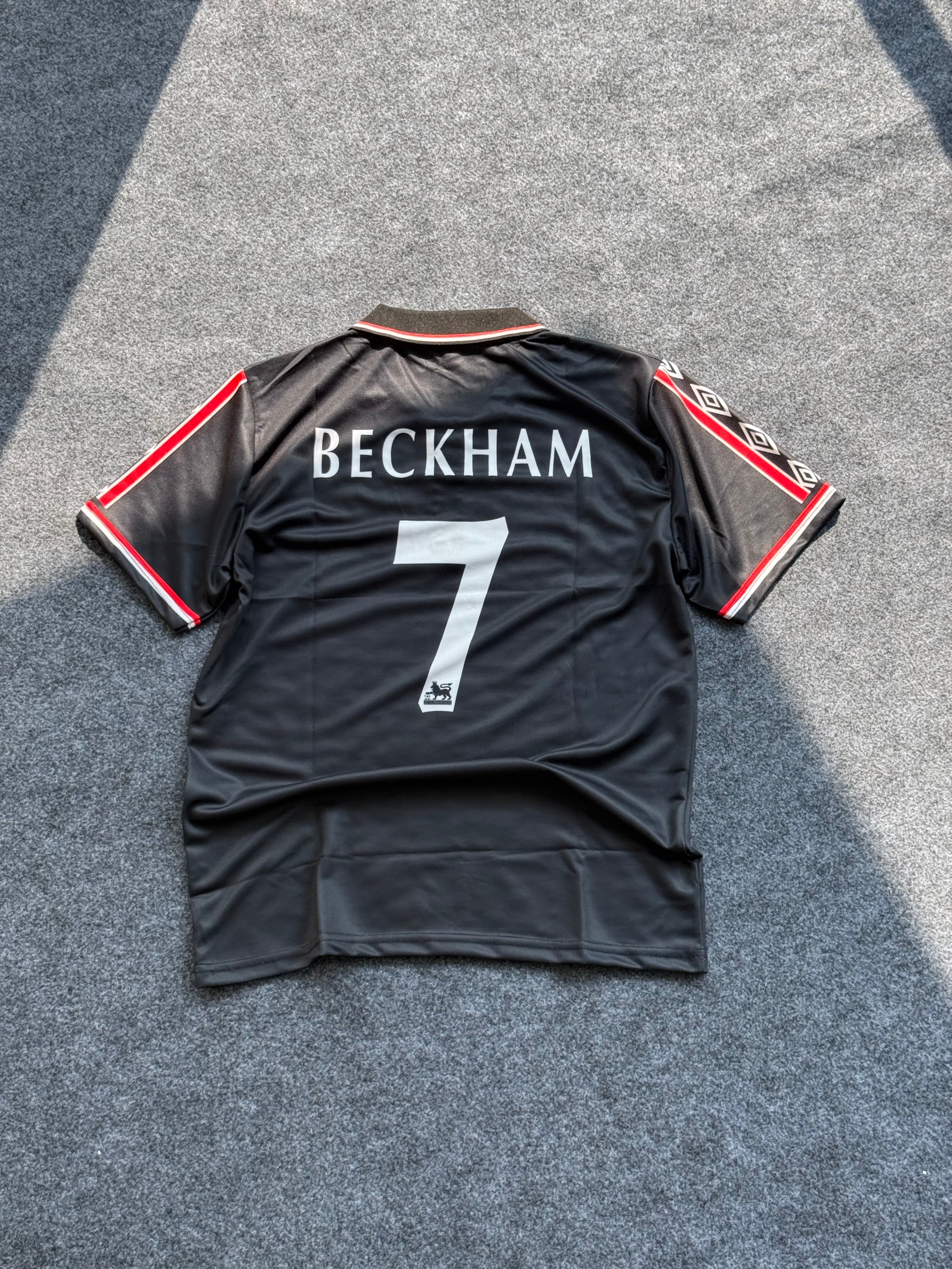 Manchester United 1998-99 season black third football jersey.