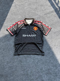 Manchester United 1998-99 season black third football jersey.
