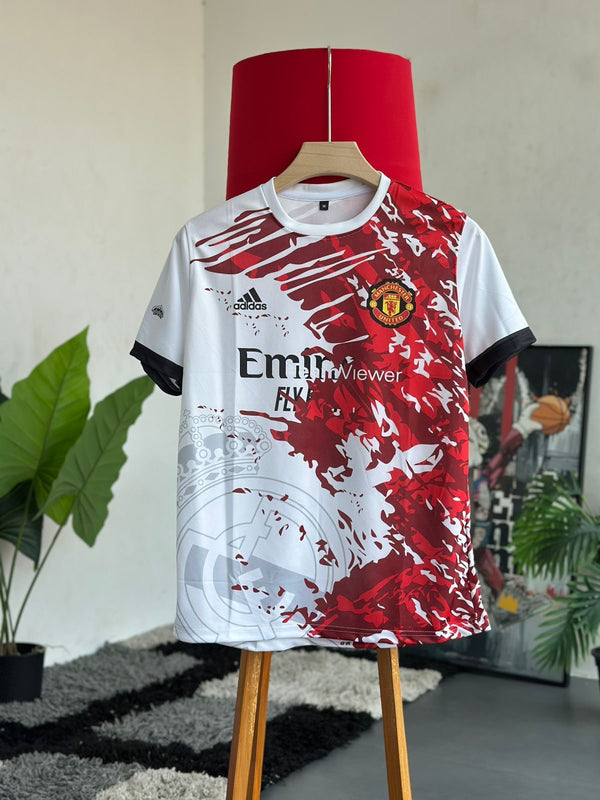 featuring a split design between Manchester United and Real Madrid