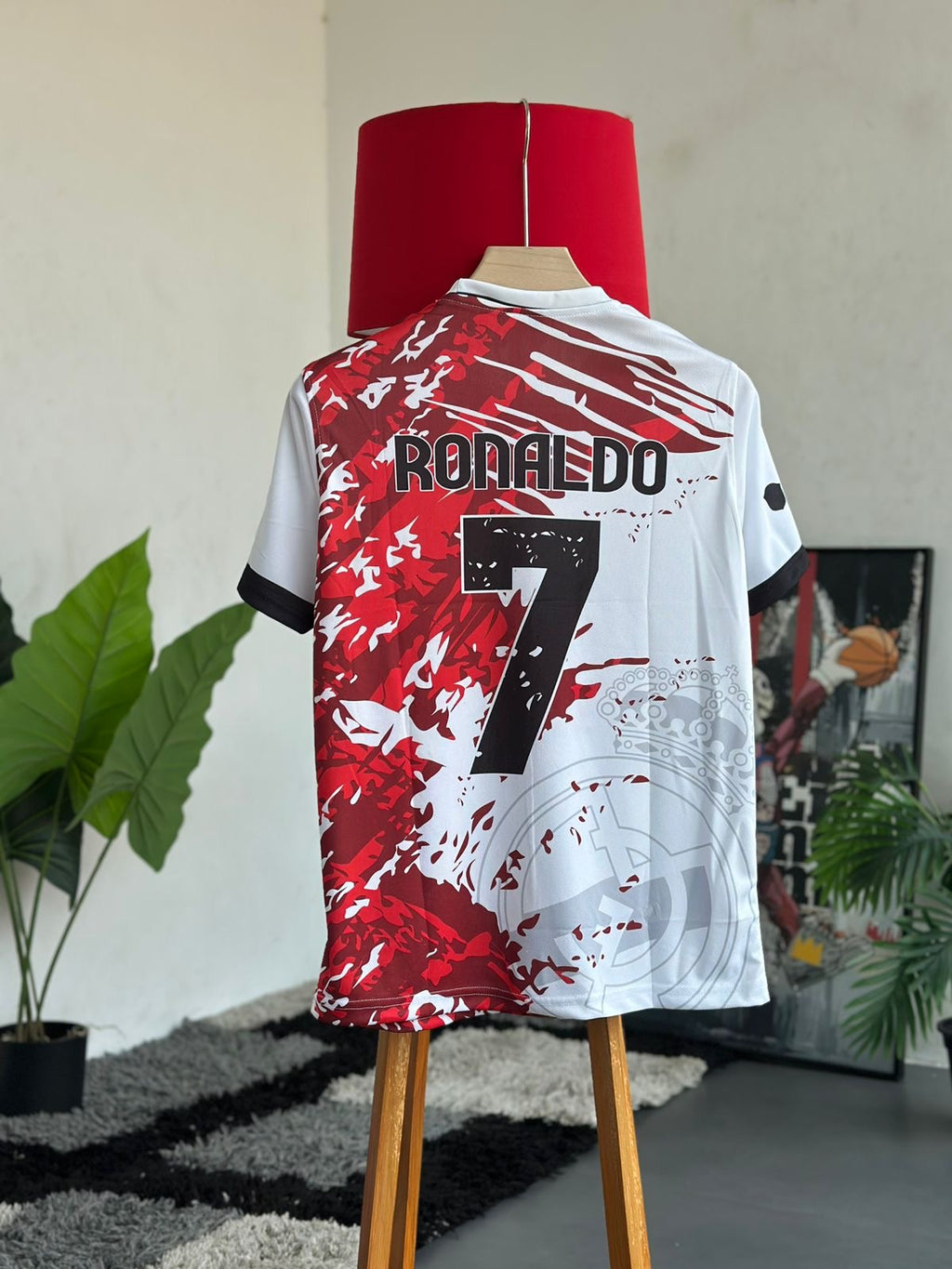 featuring a split design between Manchester United and Real Madrid