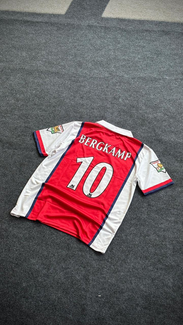Arsenal 1998-99 home football jersey  with "BERGKAMP 10" on the back.